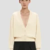 Cardigan à poches torsadées, couleur ivoire
