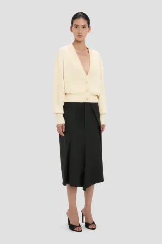 Cardigan à poches torsadées, couleur ivoire