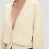 Cardigan à poches torsadées, couleur ivoire