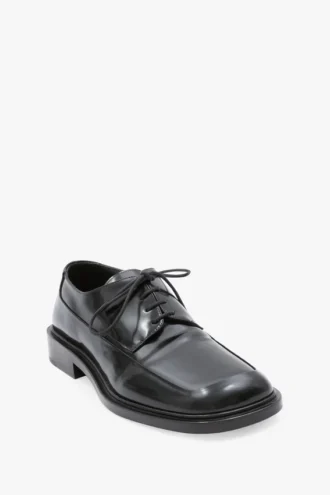 Chaussure plate à lacets en cuir noir