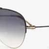 Lunettes de soleil aviateur en métal fin, dorées et noires Lunettes de soleil aviateur en métal fin, dorées et noires