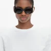 Lunettes de soleil à motif monogramme en noir Lunettes de soleil à motif monogramme en noir