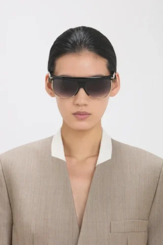 Lunettes de soleil sculptées en métal et acétate avec monture plate