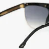 Lunettes de soleil sculptées en métal et acétate avec monture plate
