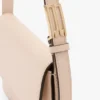 Sac de poche Dorian en cuir rose pâle Sac de poche Dorian en cuir rose pâle